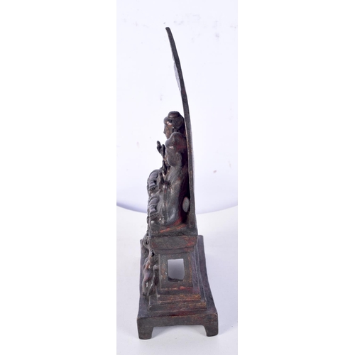 3121 - A Chinese Tibetan bronze statue of Buddhas praying on an altar. 22cm.