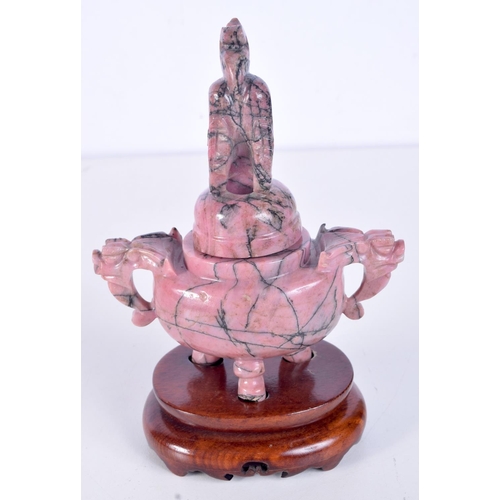 3137 - A Chinese carved Rhodonite incense burner in the form of a beast on a stand. 17cm.