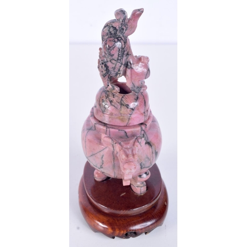 3137 - A Chinese carved Rhodonite incense burner in the form of a beast on a stand. 17cm.