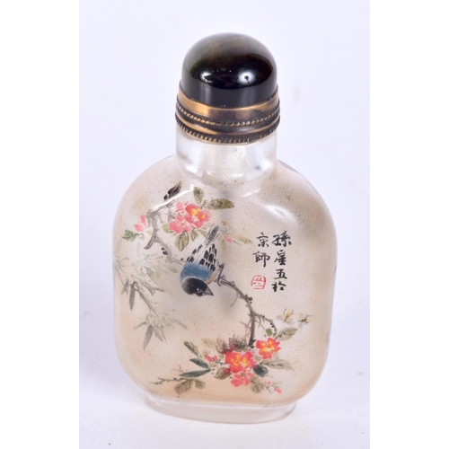 3144 - A Chinese Peking glass snuff bottle decorated with birds and foliage. 7cm.