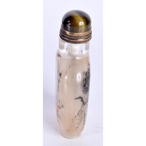 3144 - A Chinese Peking glass snuff bottle decorated with birds and foliage. 7cm.