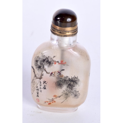 3144 - A Chinese Peking glass snuff bottle decorated with birds and foliage. 7cm.