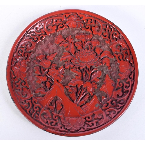 3146 - A Chinese carved Cinnabar dish. 15cm.