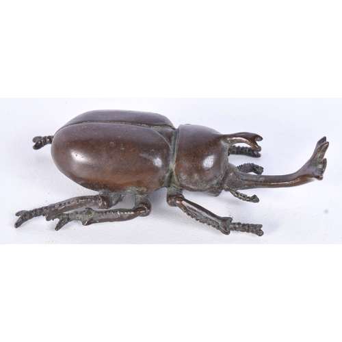 3154 - A Japanese bronze stag beetle. 8cm.