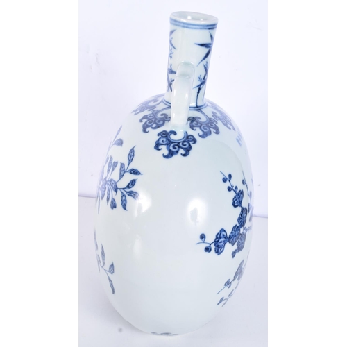 3155 - A Chinese porcelain blue and white moon flask decorated with birds in a tree. 28cm.