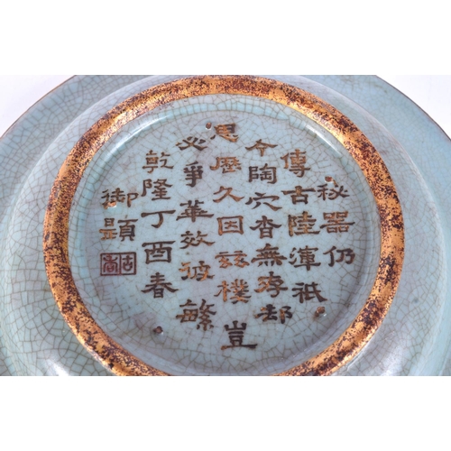 3156 - A Chinese porcelain Celadon petal shaped dish with gilt edging and calligraphy to base. 6 x 20cm.