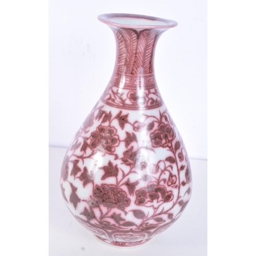 3161 - A Chinese porcelain red under glazed Yuhuchunping vase decorated with lotus plant. 27cm.