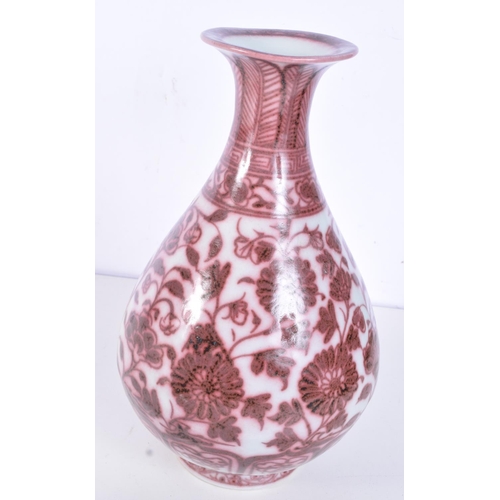 3161 - A Chinese porcelain red under glazed Yuhuchunping vase decorated with lotus plant. 27cm.