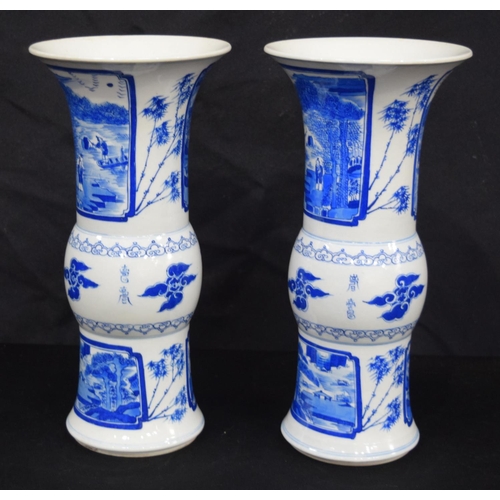 3185 - A pair of Chinese porcelain blue and white Yen Yen vases decorated with figures in a landscape. (2).... 