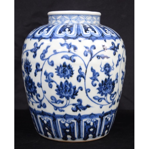 3186 - A Chinese porcelain blue and white jar decorated with lotus. 21cm high.