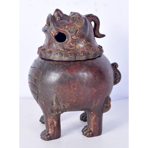 3204 - A Chinese lidded bronze censor in the form of a beast.19cm.