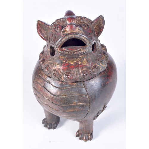 3204 - A Chinese lidded bronze censor in the form of a beast.19cm.