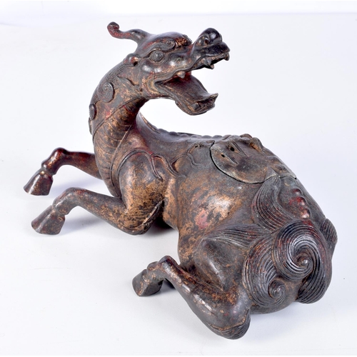 3206 - A Chinese bronze incense burner in a form of a beast. 17 x 25cm.