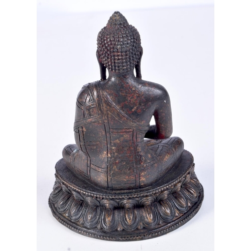 3208 - A Chinese Tibetan bronze buddha 15cm.
