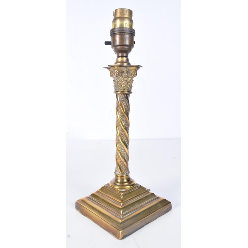 A pair of brass Empire style column lampstands together with an ...