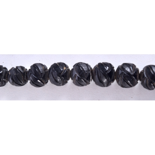 780 - A VICTORIAN WHITBY JET NECKLACE.  101cm long, weight 111g