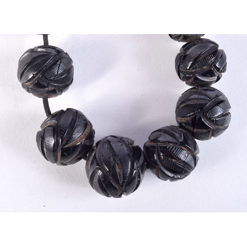 780 - A VICTORIAN WHITBY JET NECKLACE.  101cm long, weight 111g