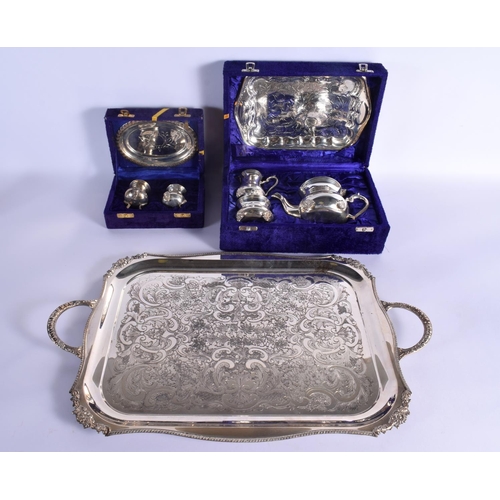 20 - A LARGE SILVER PLATED TRAY together with two boxed sets. Largest 52 cm x 34 cm.