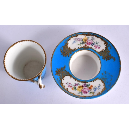 245 - 18TH CENTURY SEVRES TREMBLEUSE CUP AND SAUCER PAINTED WITH FLOWERS IN GILDED CARTOUCHES ON A TURQUOI... 