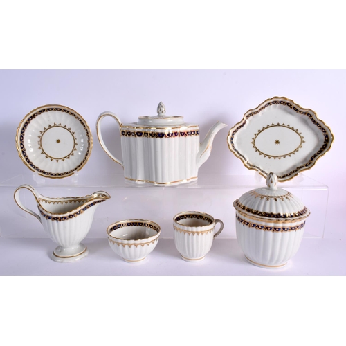256 - LATE 18TH CENTURY NEW HALL FLUTED PART TEA SERVICE  PAINTED IN BLUE AND GILT WITH PATTERN `155'   CO... 