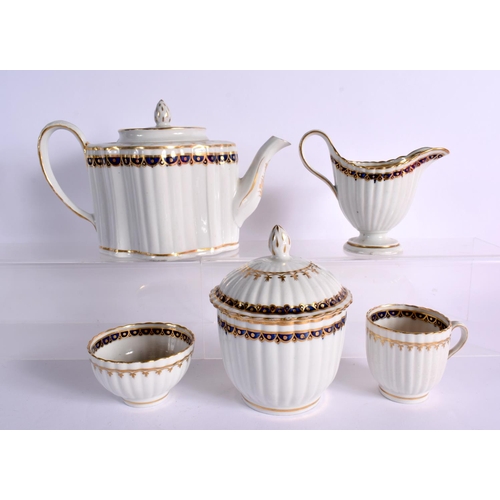 256 - LATE 18TH CENTURY NEW HALL FLUTED PART TEA SERVICE  PAINTED IN BLUE AND GILT WITH PATTERN `155'   CO... 