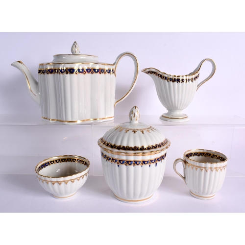 256 - LATE 18TH CENTURY NEW HALL FLUTED PART TEA SERVICE  PAINTED IN BLUE AND GILT WITH PATTERN `155'   CO... 