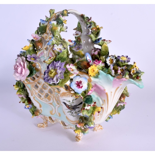 26 - A MID 19TH CENTURY CONTINENTAL PORCELAIN BASKET encrusted all over with foliage  painted with birds.... 