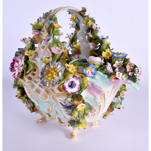 26 - A MID 19TH CENTURY CONTINENTAL PORCELAIN BASKET encrusted all over with foliage  painted with birds.... 