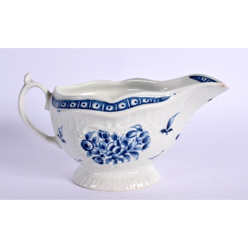 267 - 18TH CENTURY WORCESTER SAUCEBOAT PAINTED WITH THE STRAP FLUTED FLORAL PATTERN. 8.5cm High