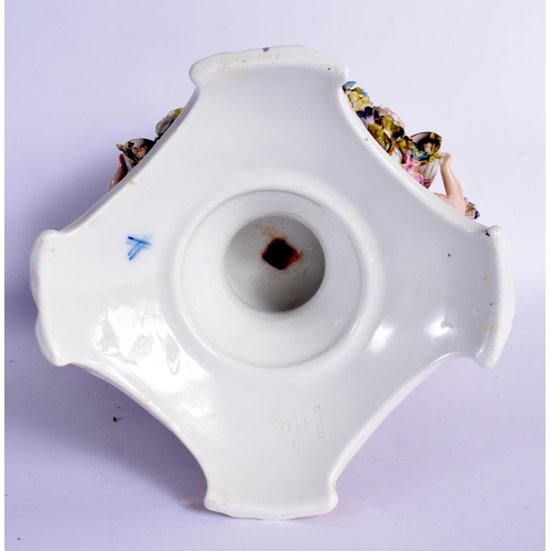 27 - A LARGE EARLY 20TH CENTURY GERMAN PORCELAIN VASE AND COVER with figural cherub supports. 42 cm x 24 ... 