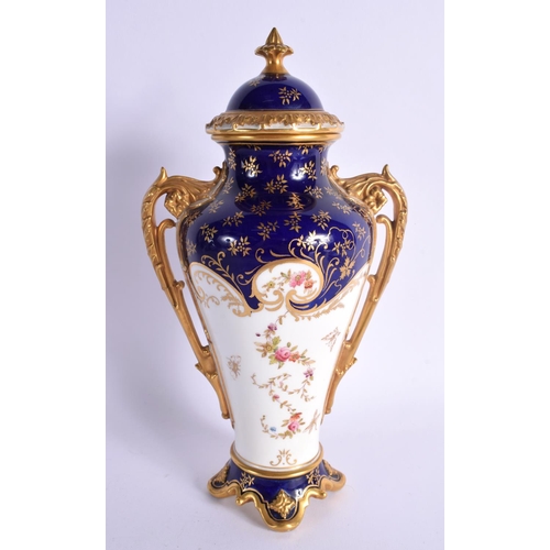 283 - LATE 19TH EARLY 20TH CENTURY COALPORT VASE AND COVER PAINTED WITH A BIRD ON A COBALT BLUE AND GILT G... 