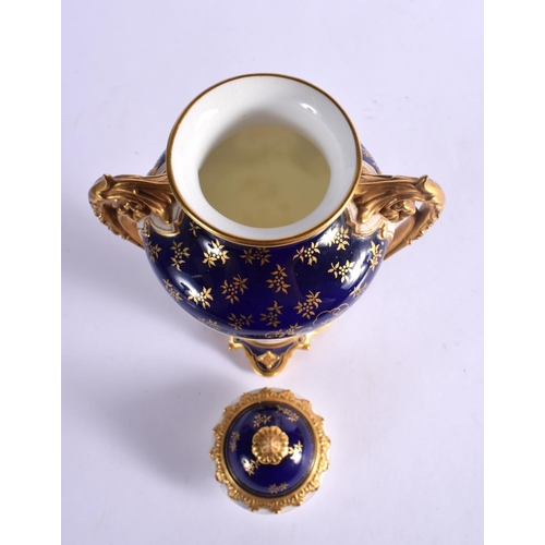 283 - LATE 19TH EARLY 20TH CENTURY COALPORT VASE AND COVER PAINTED WITH A BIRD ON A COBALT BLUE AND GILT G... 