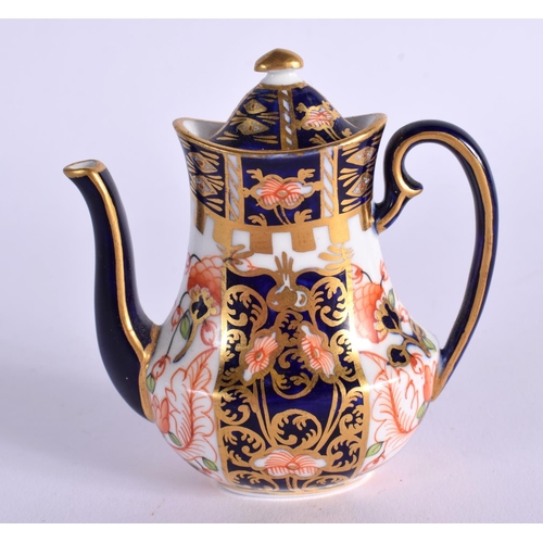 287 - ROYAL CROWN DERBY MINIATURE COFFEE POT AND COVER PATTERN 6299 PRE-1921. 7.5cm High