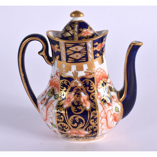 287 - ROYAL CROWN DERBY MINIATURE COFFEE POT AND COVER PATTERN 6299 PRE-1921. 7.5cm High