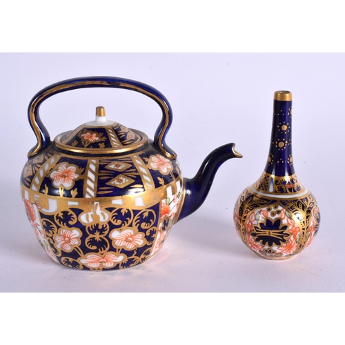 289 - ROYAL CROWN DERBY KETTLE AND COVER PAINTED WITH PATTERN 6299 DATE MARK 1919 AND A BOTTLE VASE SIMILA... 