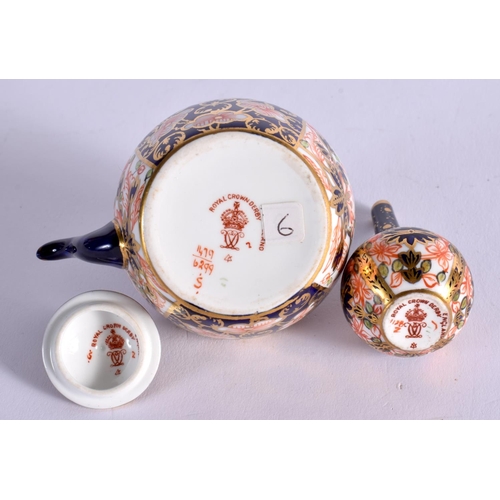 289 - ROYAL CROWN DERBY KETTLE AND COVER PAINTED WITH PATTERN 6299 DATE MARK 1919 AND A BOTTLE VASE SIMILA... 