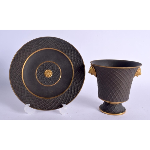 296 - 19TH CENTURY BASALT FINE BASKET WEAVE BEAKER AND SAUCER WITH GILT DECORATION. Cup 10.5cm High  Sauce... 