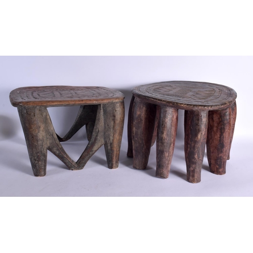 366 - A LARGE NEAR PAIR OF EARLY 20TH CENTURY AFRICAN TRIBAL WOOD STOOLS with chip carved decoration. Larg... 