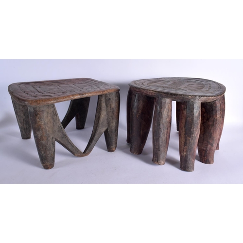 366 - A LARGE NEAR PAIR OF EARLY 20TH CENTURY AFRICAN TRIBAL WOOD STOOLS with chip carved decoration. Larg... 