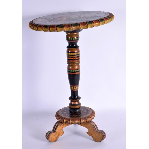 367 - AN UNUSUAL INDIAN PAINTED WOODEN TABLE depicting a female having her feet washed. 44 cm x 20 cm.