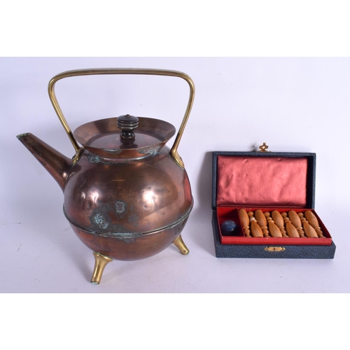 369 - AN ARTS AND CRAFTS COPPER TEAPOT in the manner of Dresser  together with a cased set of skittles. La... 