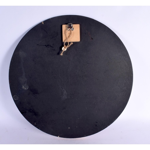 372 - AN UNUSUAL ASTRONAUT CARVED WOOD HANGING CHALK BOARD. 42 cm diameter.