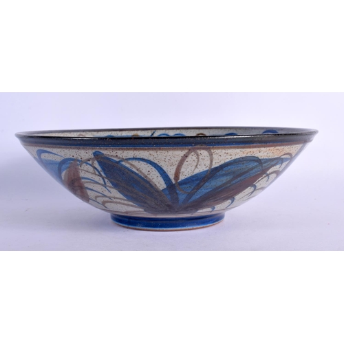374 - A 1990S STUDIO POTTERY BOWL together with a similar ge type stoneware dish. Largest 22 cm wide. (2)