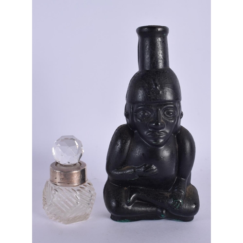 377 - A VERY UNUSUAL SOUTH AMERICAN STYLE GLASS SCENT BOTTLE with contents  together with a silver mounted... 