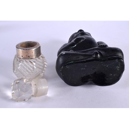377 - A VERY UNUSUAL SOUTH AMERICAN STYLE GLASS SCENT BOTTLE with contents  together with a silver mounted... 