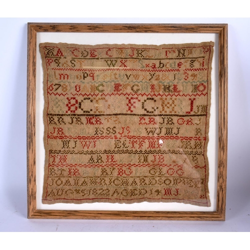 379 - A FRAMED 19TH CENTURY EMBROIDERED SAMPLER. 33 cm square.
