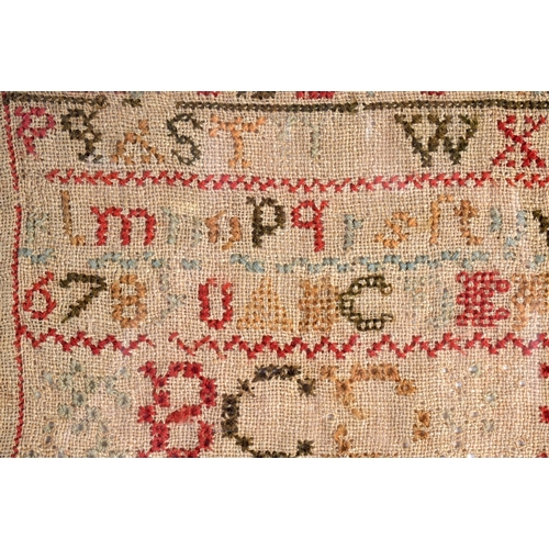 379 - A FRAMED 19TH CENTURY EMBROIDERED SAMPLER. 33 cm square.
