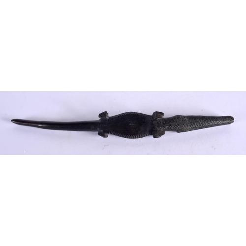 380 - AN EARLY 20TH CENTURY AFRICAN TRIBAL CARVED EBONY CROCODILE. 40 cm long.