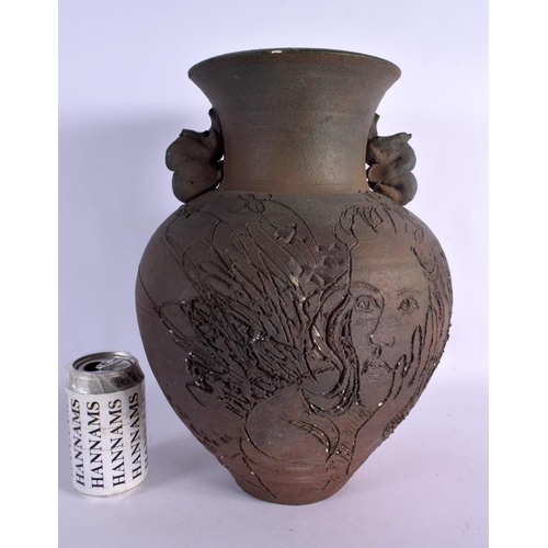 382 - AN UNUSUAL RETRO STUDIO POTTERY STONEWARE VASE engraved with a female portrait. 38 cm x 18 cm.
