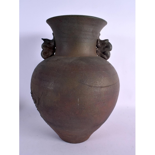 382 - AN UNUSUAL RETRO STUDIO POTTERY STONEWARE VASE engraved with a female portrait. 38 cm x 18 cm.